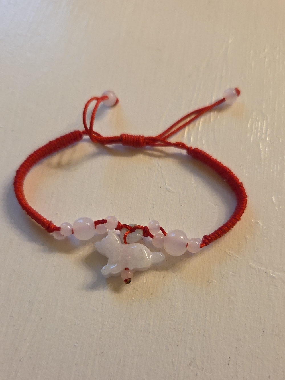 Red Cord Bracelet with White Bead Wolf Charm